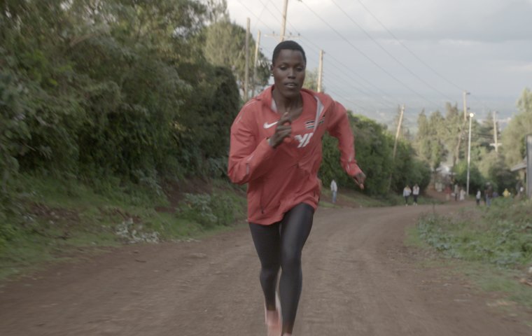 wide shot Eva Makena running
