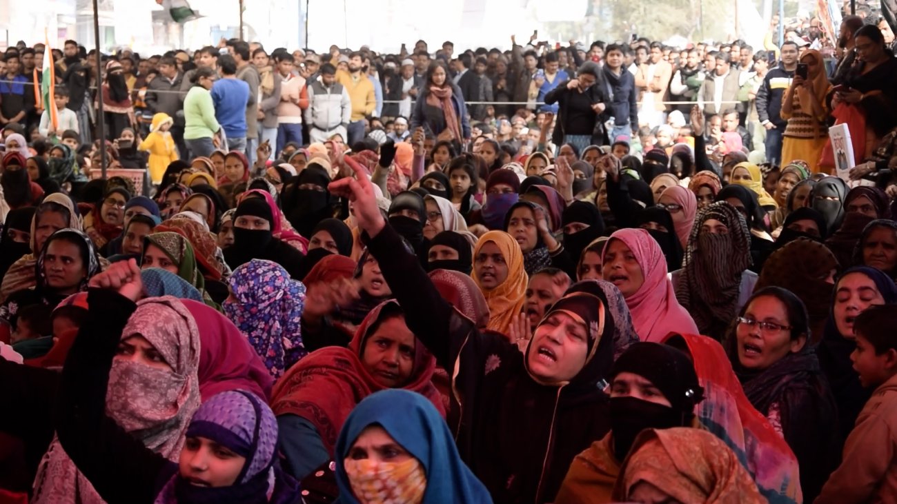 shot of crowd of women with headscaves at a protest